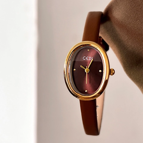 Montre Quartz Femme Boîtier Alliage Ovale Bracelet Cuir Rétro Vintage Mince Étanche Élégante Pour Dame