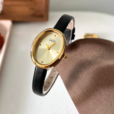 Montre Quartz Femme Boîtier Alliage Ovale Bracelet Cuir Rétro Vintage Mince Étanche Élégante Pour Dame