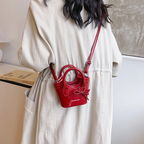Mini Borsa A Secchiello Pelle PU Effetto Rughe Metallico Borsa A Mano Tracolla Con Ciondolo Stella E Fiocco
