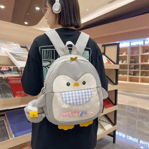 Sac À Dos Pingouin Dessin Animé Pour Enfants Sac D'école Mignon En Nylon Avec Fenêtre Transparente Pompons Et Pendentif