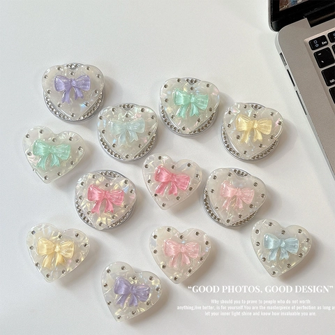 Supporto Per Telefono A Forma Di Cuore Resina Iridescente Supporto Pieghevole Con Fiocco 3D E Decorazione In Strass Stile Dolce