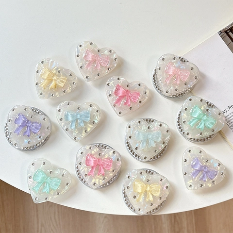 Supporto Per Telefono A Forma Di Cuore Resina Iridescente Supporto Pieghevole Con Fiocco 3D E Decorazione In Strass Stile Dolce