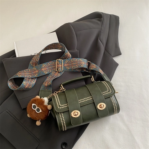 Vintage PU Leather Cylinder Shoulder Bag With Wide Jacquard Strap Rivets Twist Lock And Plush Monster Charm Handbag