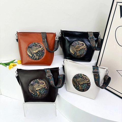 Retro Ethnic Women Shoulder Bag Large Capacity PU Leather Bucket Bag With Elephant Relief And Patterned Wide Strap
