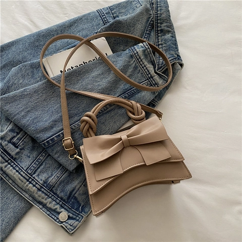 Bolso De Hombro Para Mujer Cuero PU Lazo Grande Asa Anudada Fondo Curvado Color Sólido Bolso De Moda