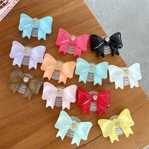 Soporte Para Teléfono Con Lazo Griptok Con Detalle De Corazón Dorado Resina Soporte Retráctil Para Teléfono Inteligente Estilo Coreano Color Sólido