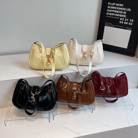 Bolso de hombro para mujer de cuero PU moderno Hebilla de metal vintage Bolso hobo Color sólido Elegante Diario Versátil