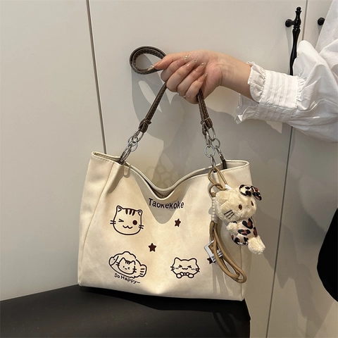 Women Canvas Tote Bag Cream White Cartoon Cat Print Large Capacity Shoulder Bag Casual Commuter With Plush Pendant