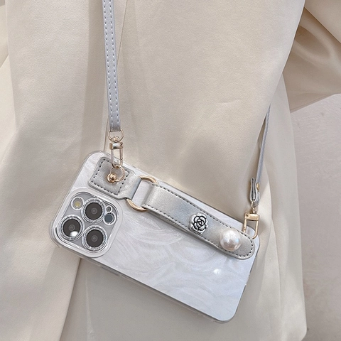 Camellia Flower Artificial Pearl Wristband Phone Case For iPhone Anti Drop Luxury Crossbody Strap Leather Hand Strap Hard Cover