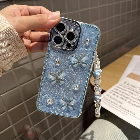 Custodia Per Telefono Blu Glitter Con Farfalla 3D Strass E Cinturino Da Polso In Perline Per iPhone Lusso