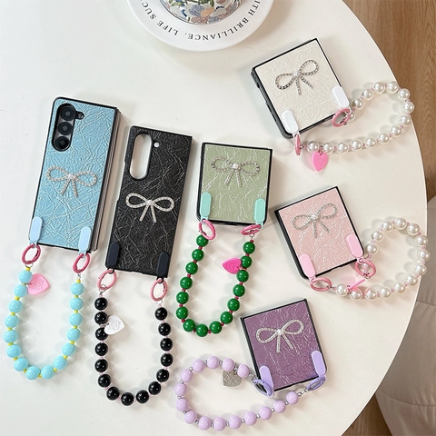 Phone Case Folding Pleated Leather Rhinestone Bow Artificial Pearl Bead Hand Chain Heart Pendant For Samsung Z Flip Fold