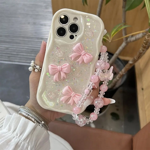 Wave Edge Phone Case With 3D Bowknot And Glitter Sequin Epoxy Creamy Sweet Style Shockproof Protective Cover With Beaded Wrist Strap