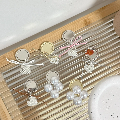 Soporte De Anillo Para Teléfono Perla Artificial Corazón Lazo Aleación Plegable Adhesivo Soporte Para Teléfono Móvil Escritorio Estilo Coreano Mujeres