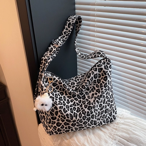 Leopard Print Canvas Crossbody Bag Large Capacity Hobo Shoulder Tote With Plush Monster Charm Adjustable Wide Strap Casual