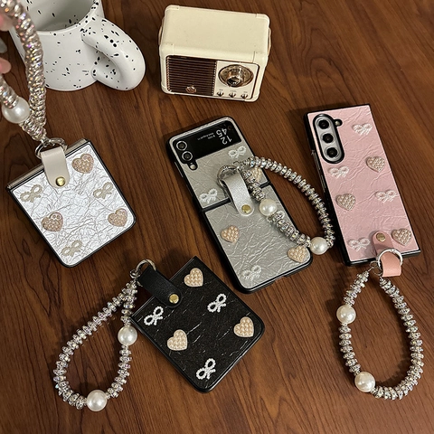 Custodia Pieghevole In Pelle PU Per Telefono Con Fiocco Di Künstliche Perle Cuore Decorativo E Grande Catena Da Polso In Künstliche Perle Per Donne