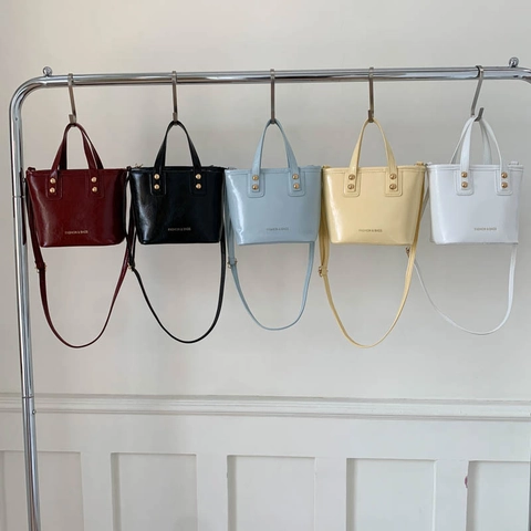 Elegante Damen Eimertasche PU Leder Minimalistischer Stil Modebeschriftung Goldniete Schulter Umhängetasche Lässig