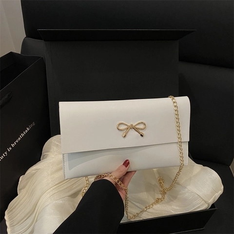 Women PU Leather Crossbody Bag Solid Color Metal Bow Buckle Envelope Shoulder Clutch Bag With Chain Strap Fashion