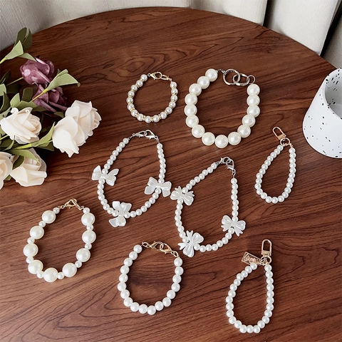 Elegante Künstliche Perlen Handy Kette Lanyard Handgelenkschlaufe Mit Schleife Anti-Verlust Mobiles Zubehör Legierung Schnalle Für Damen