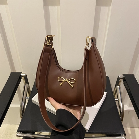 Dames PU Lederen Hobo Schoudertas Gouden Strik Accent Crescent Halve Maan Onderarm Handtas Elegante Retro Stijl