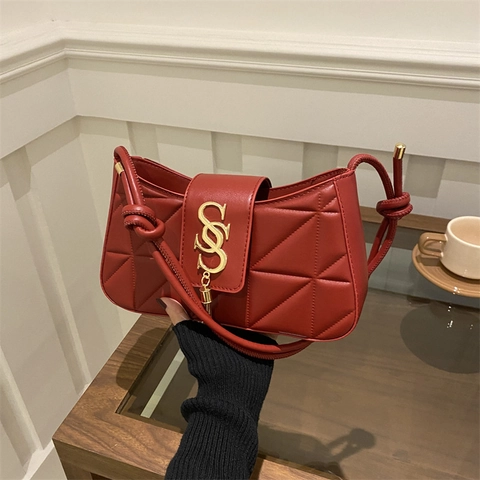 Gesteppte Schultertasche PU Leder Unterarmtasche Geometrische Nähte Quaste Metall Logo Für Damen Chic Nischen Design