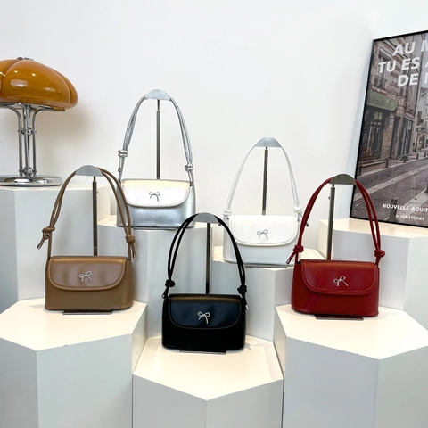 Women PU Leather Shoulder Bag With Metal Bow Decor Knotted Strap Flap Underarm Crossbody Handbag Minimalist French Style