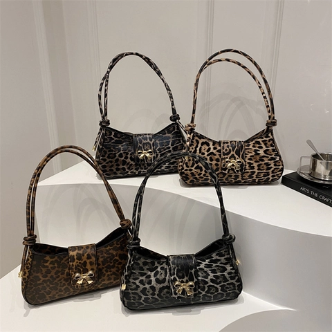 Luipaardprint Okseltas PU Leer Baguette Schoudertas Met Gouden Strik Chique Retro Stijl Dames Handtas
