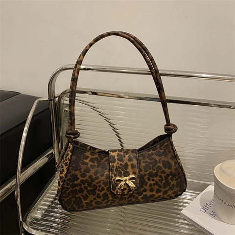 Luipaardprint Okseltas PU Leer Baguette Schoudertas Met Gouden Strik Chique Retro Stijl Dames Handtas