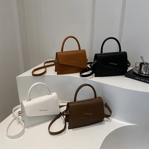 Minimalistische Damen PU Leder Schulter Umhängetasche Asymmetrische Klappe Griff Mode Quadratische Tasche