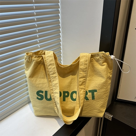 Große Kapazität Segeltuch Tragetasche Mit Support Buchstaben-Druck Kordelzug Schultertasche Casual Schule Shopping Handtasche Damen