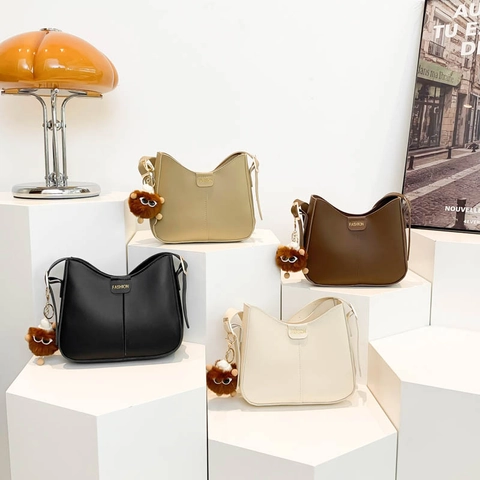 Women PU Leather Shoulder Bag Crescent Half Moon Minimalist Chic Underarm Bag With Plush Toy Pendant Solid Color