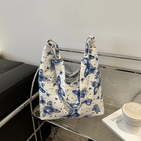 Women Large Capacity PU Leather Tote Bag With Artistic Butterfly And Star Print Vintage Urban Minimalist Shoulder Bag