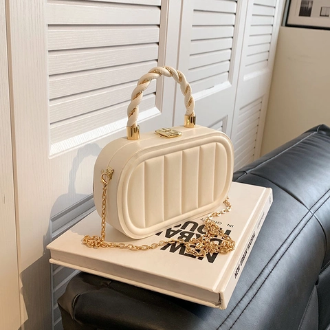 Women Vertical Striped Quilted Handbag Trendy PU Leather Oval Box Crossbody Bag With Gold Chain And Twisted Handle