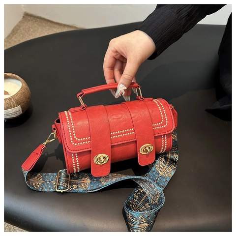 Women PU Leather Cylinder Crossbody Bag With Rivet Double Swivel Lock And Wide Ethnic Pattern Strap Vintage Handbag