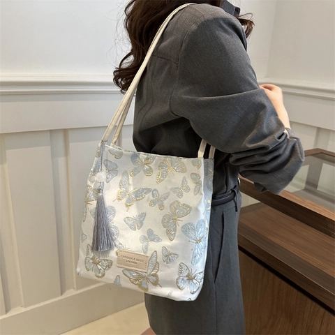 Dames Borduurwerk Jacquard Tote Bag Met Vlinder Bloem Patronen Leren Patch Kwastje Hanger Schoudertas