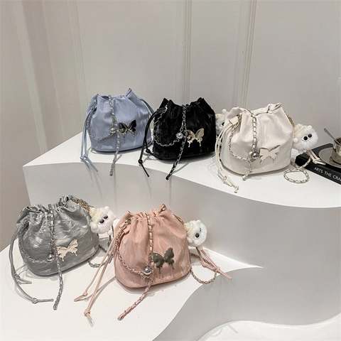 Women Bucket Crossbody Bag PU Leather Metal Butterfly Drawstring Chain Strap Pleated Textured Niche Design