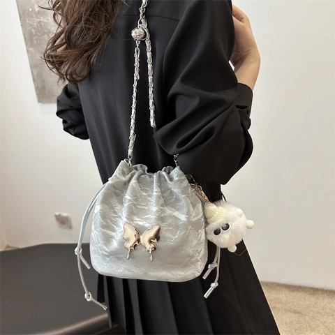 Women Bucket Crossbody Bag PU Leather Metal Butterfly Drawstring Chain Strap Pleated Textured Niche Design