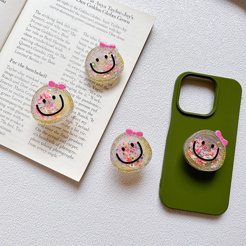 Supporto Per Telefono Con Faccina Sorridente Supporto In Resina Retraibile Fiocco Rosa Glitter Paillettes Presa Espandibile