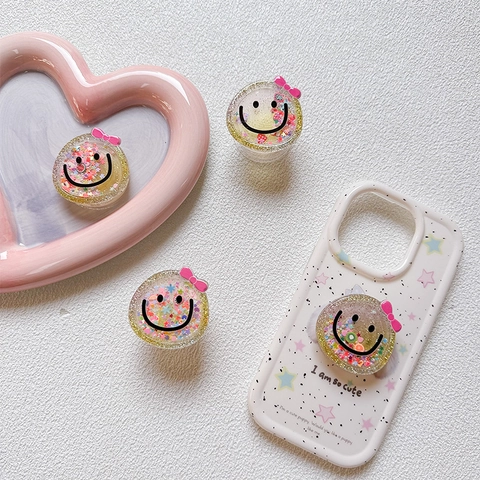 Supporto Per Telefono Con Faccina Sorridente Supporto In Resina Retraibile Fiocco Rosa Glitter Paillettes Presa Espandibile