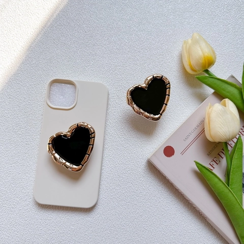 Supporto Per Telefono A Forma Di Cuore Impugnatura Airbag Bordo Dorato Elett galvanizzato Superficie Nera Lucida Retraibile Universale