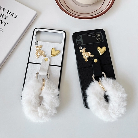 Luxury Leather Texture Foldable Phone Case With Faux Fur Pom-Pom Hand Strap Metal Bear Heart Relief Sweet Elegant