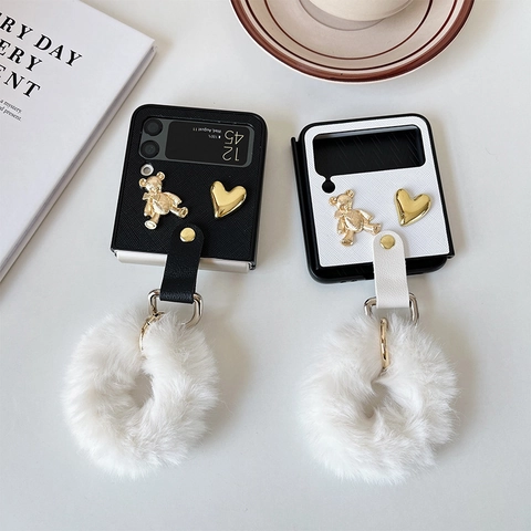 Luxury Leather Texture Foldable Phone Case With Faux Fur Pom-Pom Hand Strap Metal Bear Heart Relief Sweet Elegant