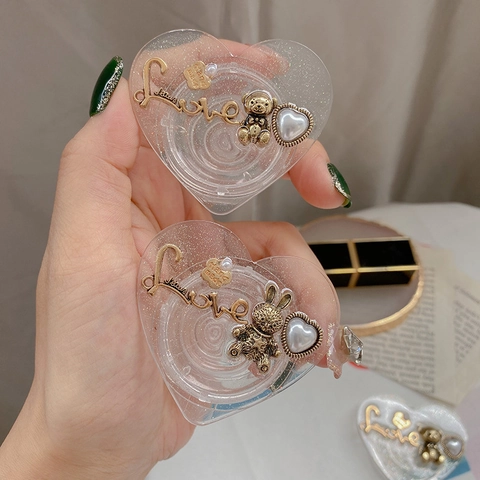 Herzförmiger Handyhalter Griptok Transparentes Harz Gold Glitzer Metall Bär Hase Faux Künstliche Perle Vintage Luxus Faltbarer Ständer
