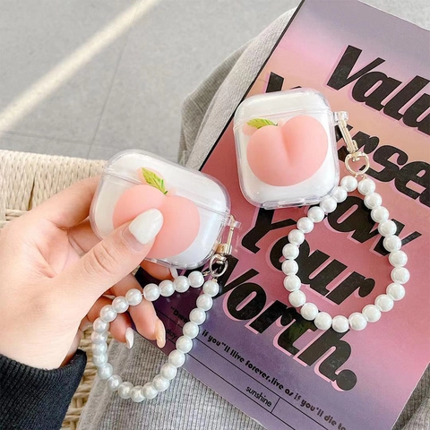 Peach Wireless Earphone Case Transparent TPU Protective Cover With Faux Artificial Pearl Hand Strap Cute Sweet Style