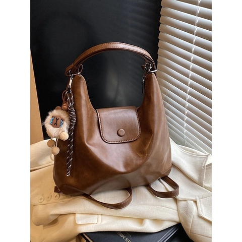 Damen Retro PU Leder Multifunktionstasche Große Kapazität Hobo Schulter Umhängetasche Rucksack Mit Plüsch Anhänger Pendler