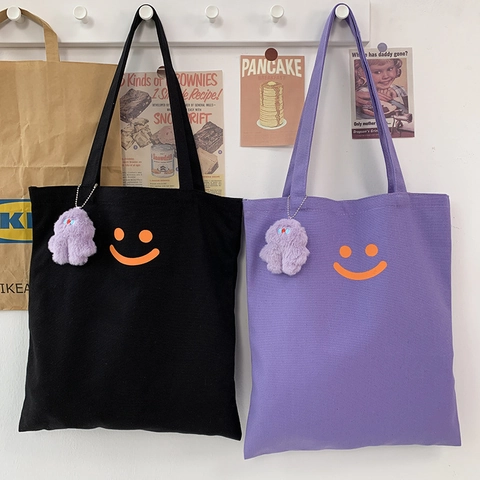 Dames Canvas Tas Smile Face Print Grote Capaciteit Schoudertas Met Pluche Hanger Studentenschool Handtas Eenvoudige Stijl