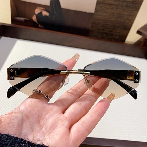 Fashion Rimless Geometric Sunglasses For Women Diamond Cut Edge PC Lens Metal Frame UV400 Protection Vintage Chic Sun Glasses