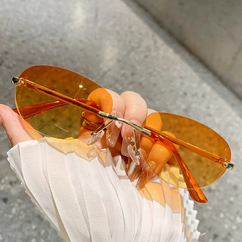 Rimless Oval Sunglasses Metal Frame UV400 PC Lenses Small Frame Fashion Eyewear For Women Retro Style