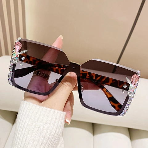 Dames Oversized Vierkante Zonnebril Randloos Strass Kristal Verlooplenzen UV400 Mode Luxe Feest Brillen