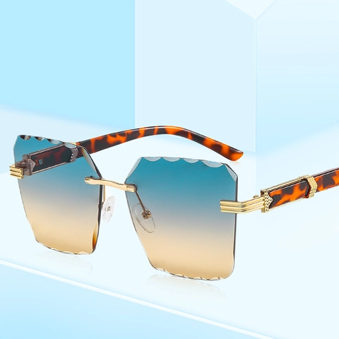 Mode Randloze Zonnebril Gegolfde Rand Lenzen UV400 Bescherming Luxe Gradiënt Brillen Voor Feest Reizen Vrouwen