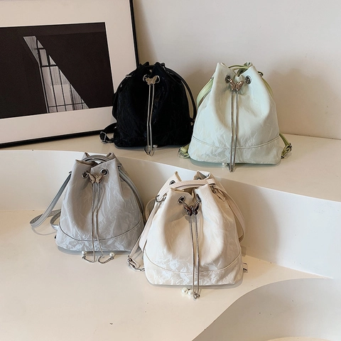 Wrinkled PU Leather Bucket Bag Drawstring Shoulder Backpack With Butterfly Buckle And Artificial Pearl Charms For Women